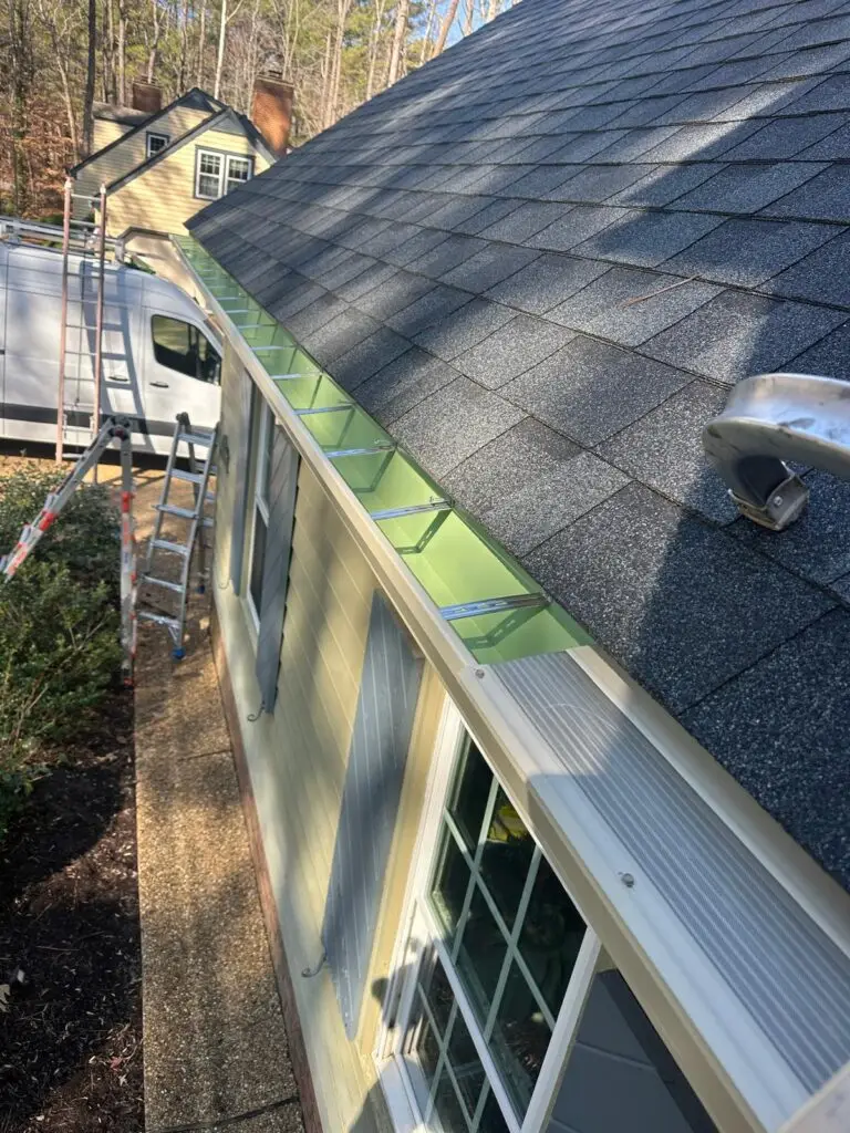 Replacing old gutters with new seamless gutter installation