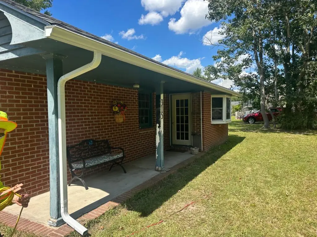Close-up of seamless downspout installation to prevent leaks in Newport News.