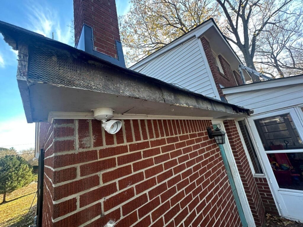 Damaged fascia board exposed during gutter replacement work in Chesapeake VA