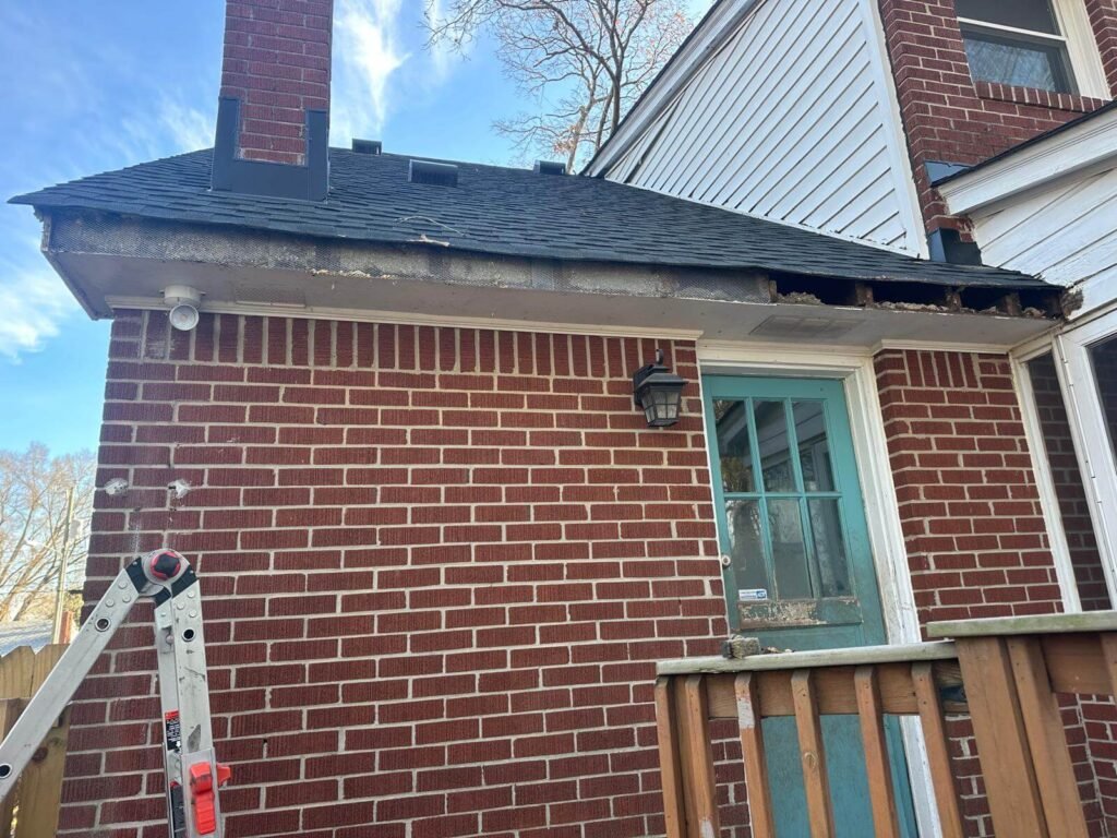 New seamless gutter installation after fascia repair on brick home in Chesapeake VA