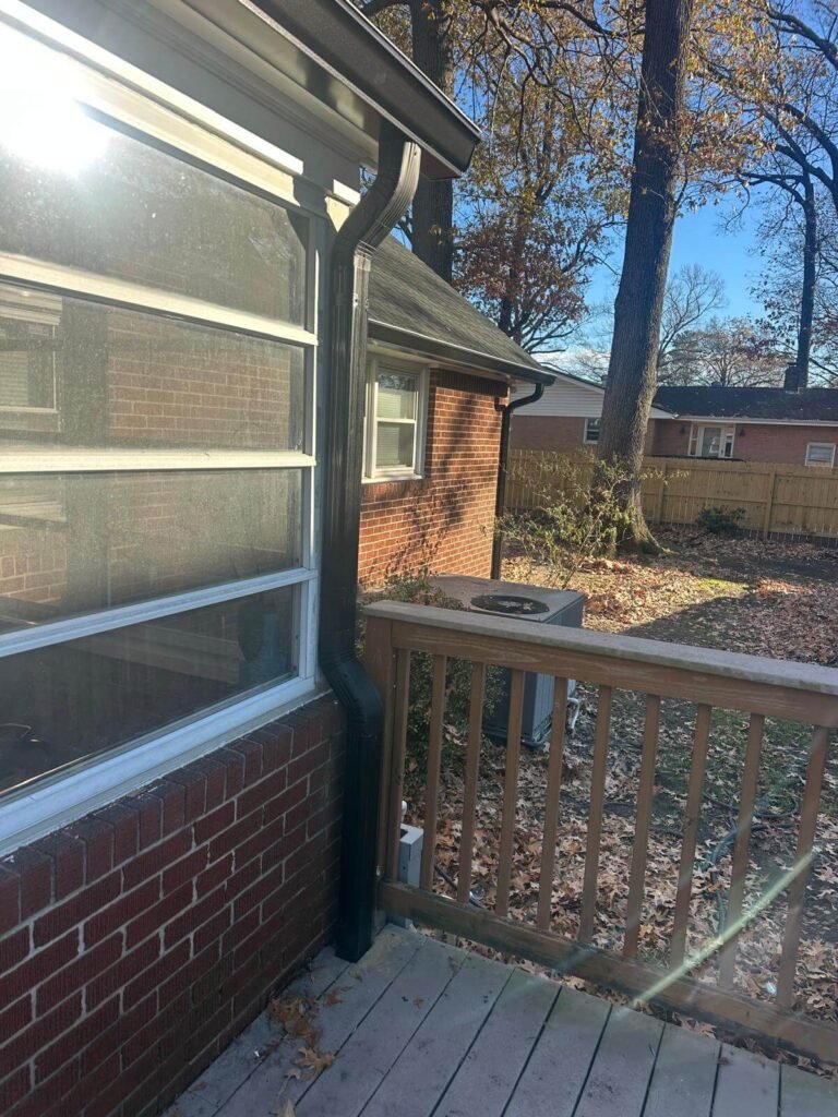 Downspout installation completed after gutter replacement project in Chesapeake VA