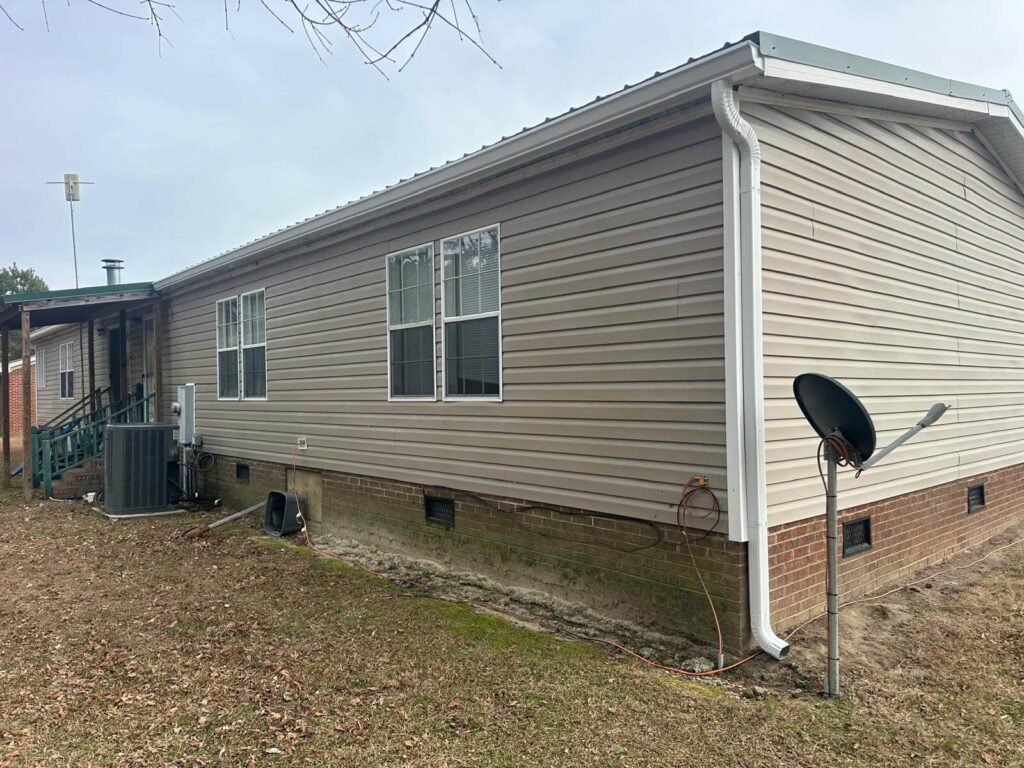Side view of seamless gutter system installed by Gutter Masters Pro in Conway NC