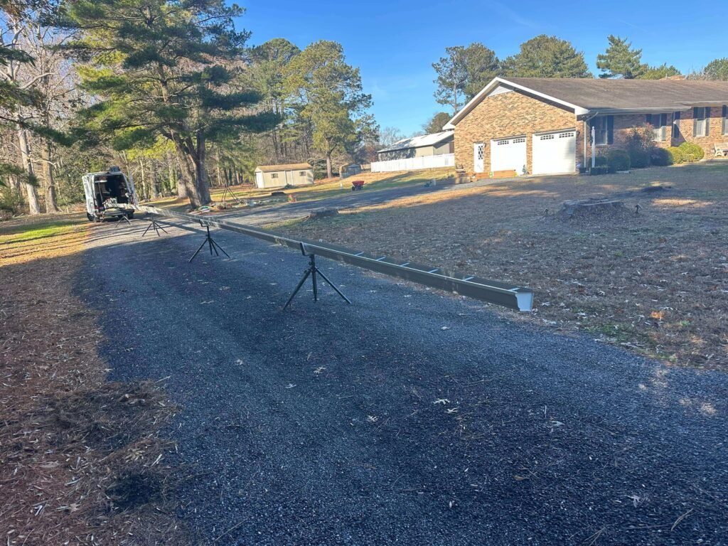 a 90 ft single piece seamless gutter extruded on site