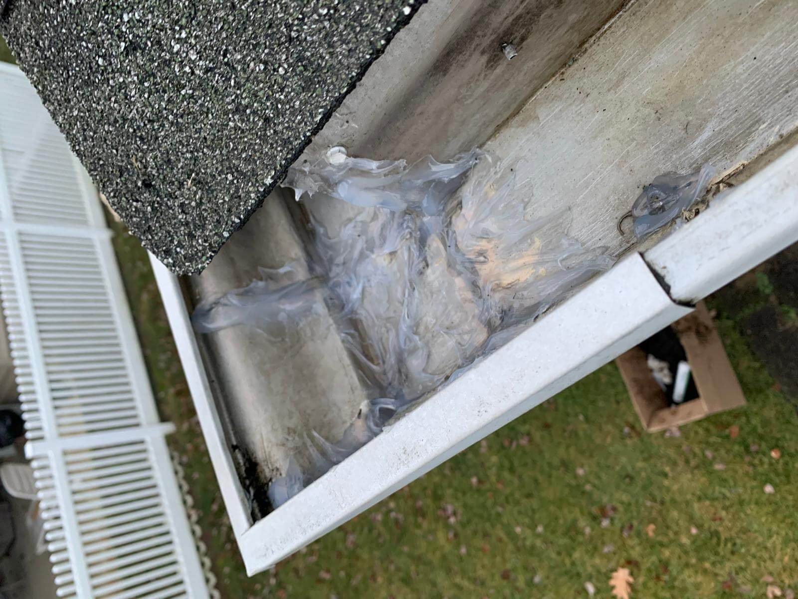 Gutter inspection and repair work in progress