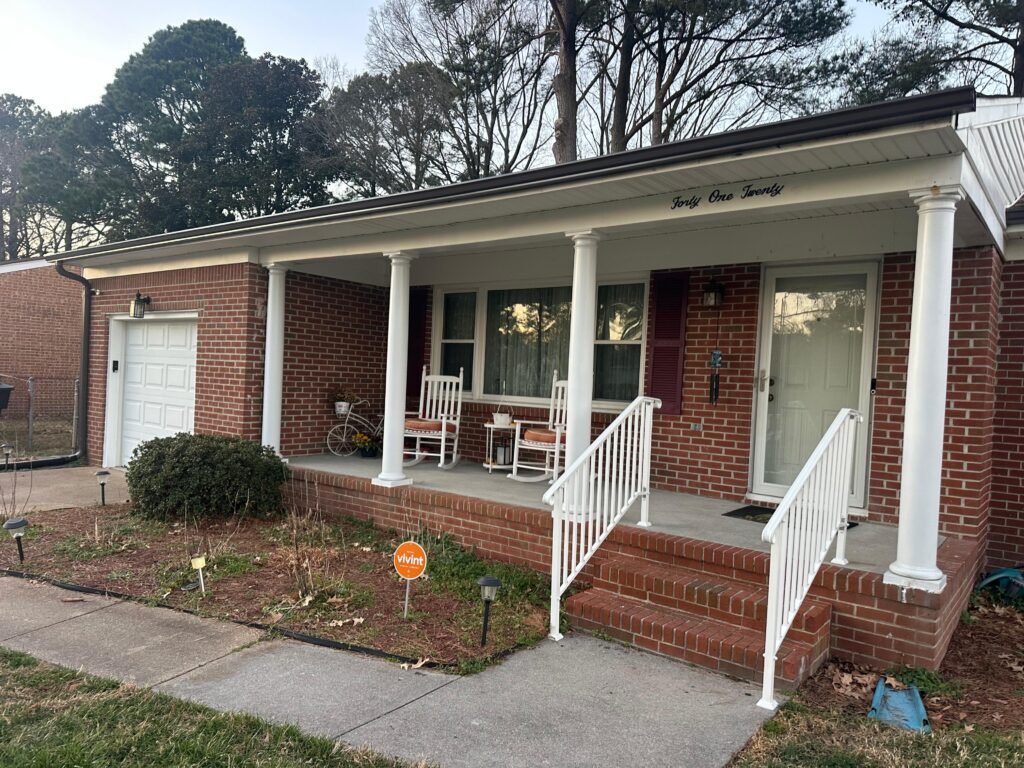 Seamless gutters installed on a brick home in Portsmouth VA after full gutter replacement