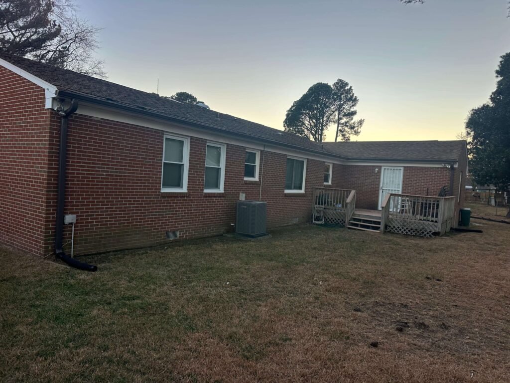 New seamless gutters installed around the home perimeter in Portsmouth VA for long-term protection