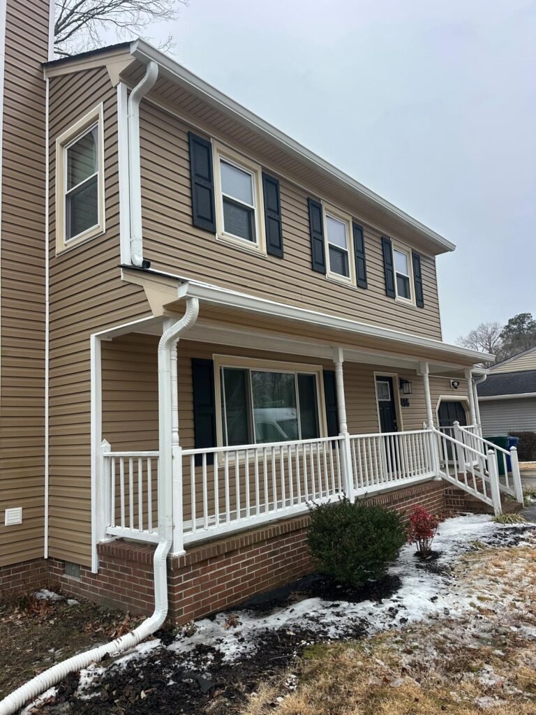 Completed seamless gutter replacement on two-story home in Newport News Virginia