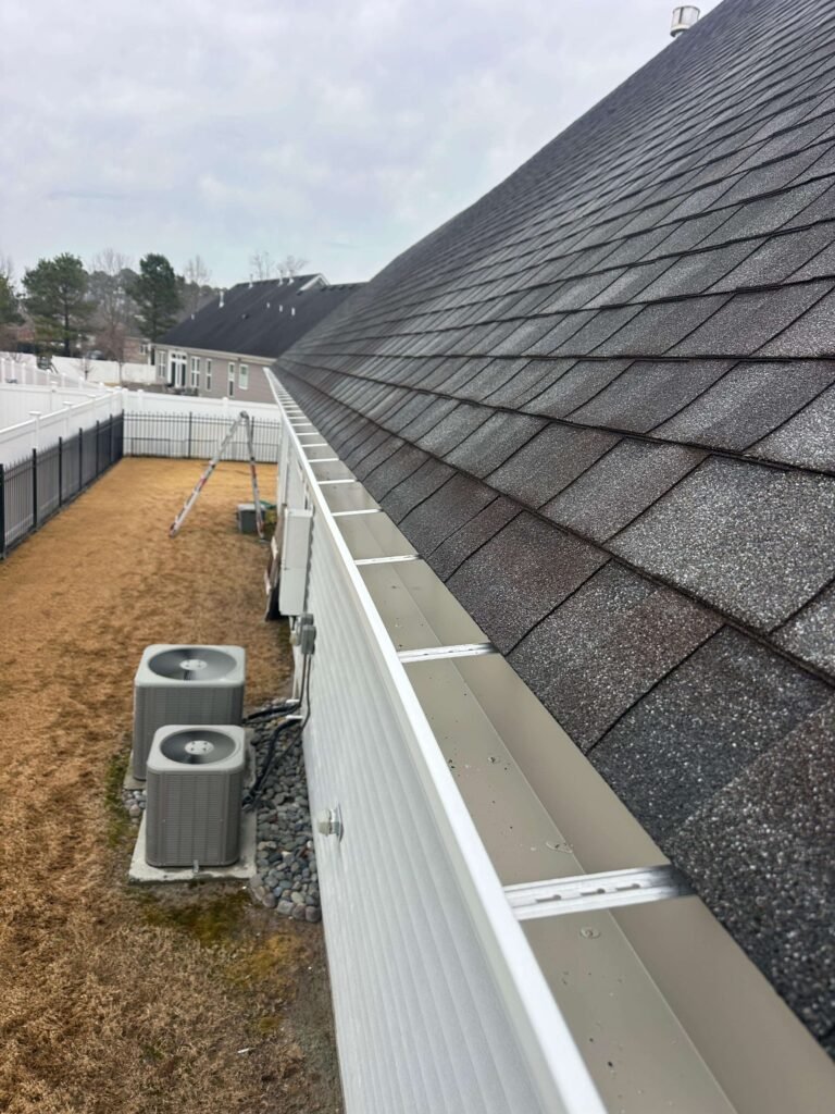 200 foot seamless gutter run with proper slope and hidden hangers in Chesapeake VA