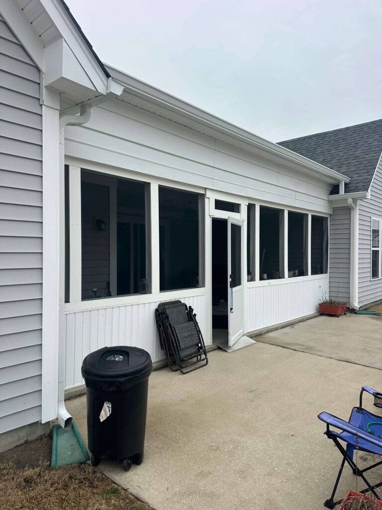 New aluminum seamless gutters installed on rear patio roof in Chesapeake Virginia