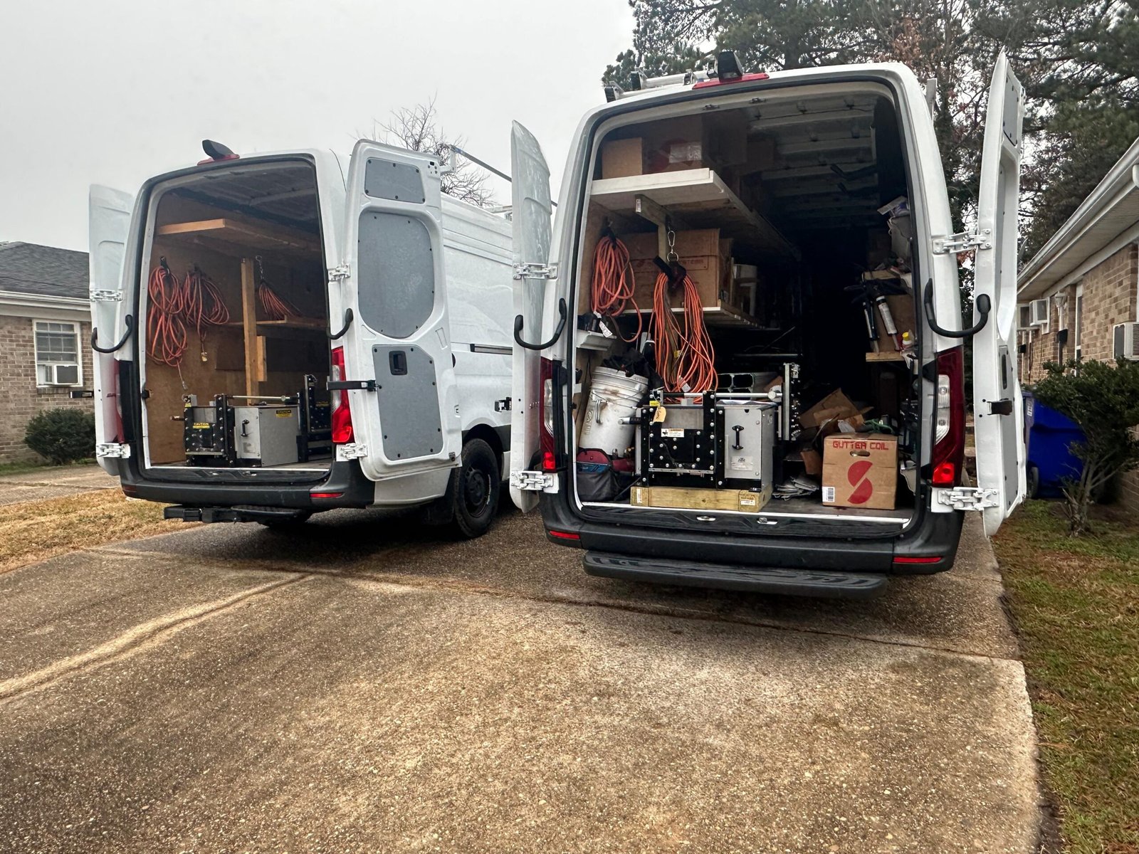 Gutter Masters Pro on-site gutter fabrication machine forming seamless aluminum gutters in Chesapeake VA