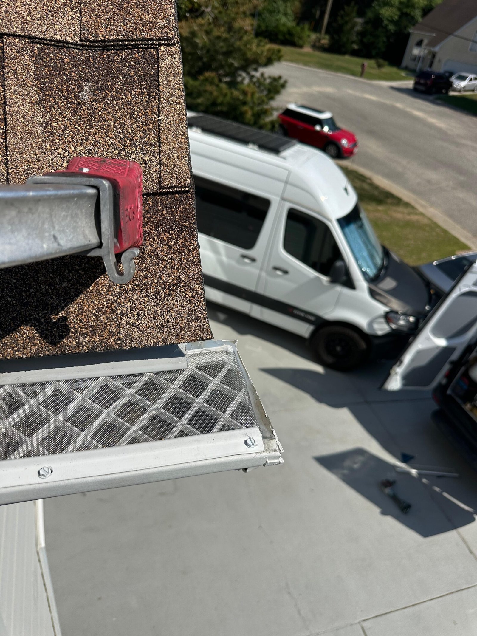 correctly installed gutter guard filter at end cap corner after professional reinstallation — Toano Virginia