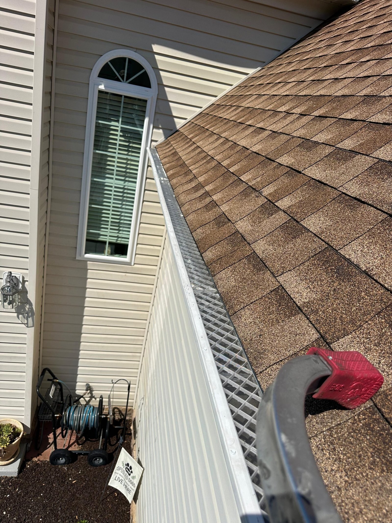 correctly installed gutter guard filter flush with gutter channel — Toano VA after professional reinstallation by Gutter Masters Pro