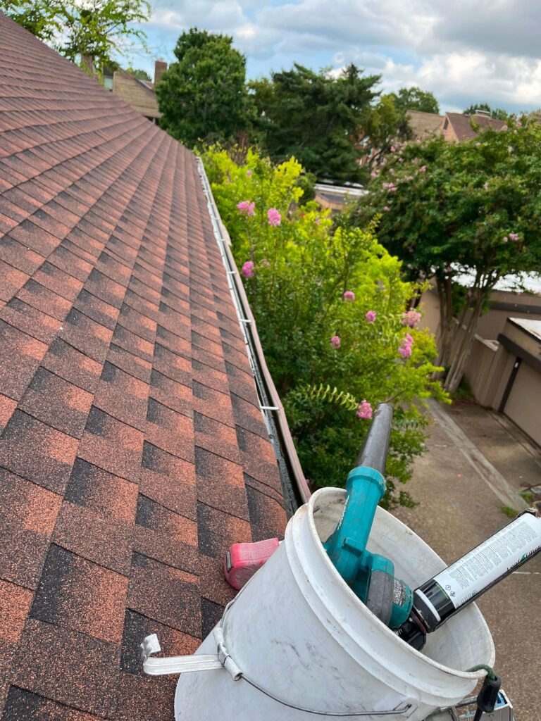 Tools and sealant used to repair a rusted gutter in Virginia Beach