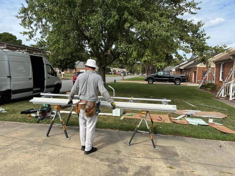 Long length of freshly formed aluminum fascia wrap on sawhorses in Chesapeake, VA