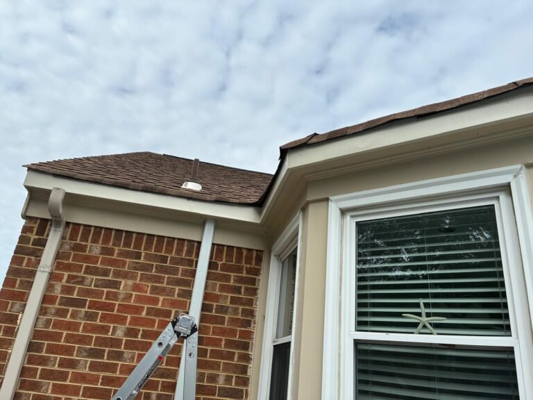 Wrapped fascia at a roofline corner with gutters removed in Chesapeake, VA
