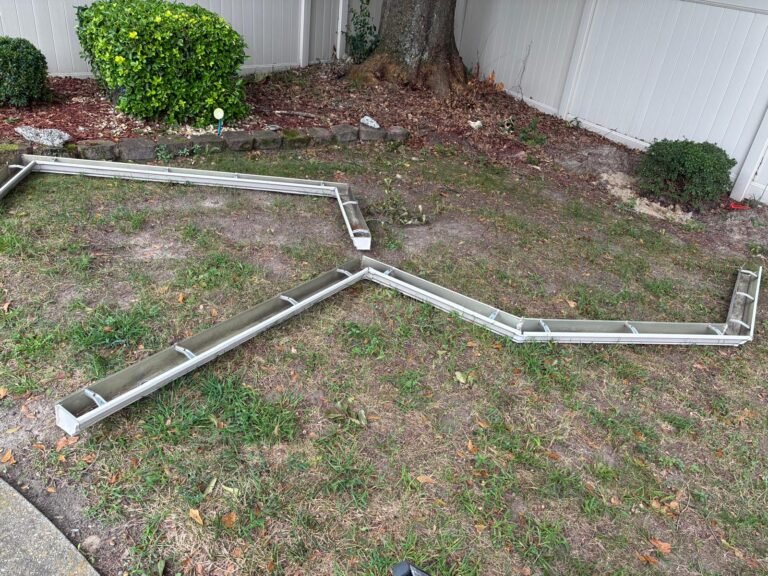 Removed gutters kept safe for cleaning and reinstallation