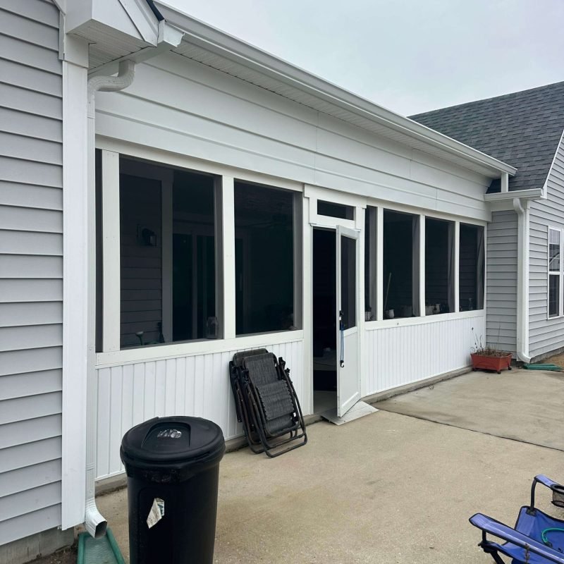 New aluminum seamless gutters installed on rear patio roof in Chesapeake Virginia