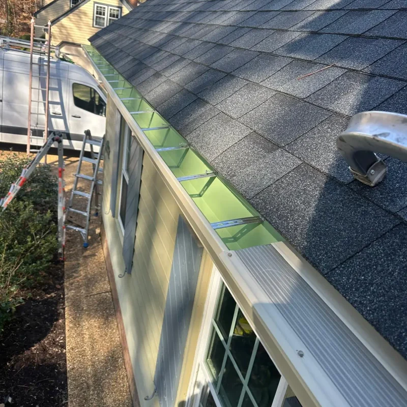 Suffolk gutter guard installation to prevent clogs and keep gutters clear year-round.