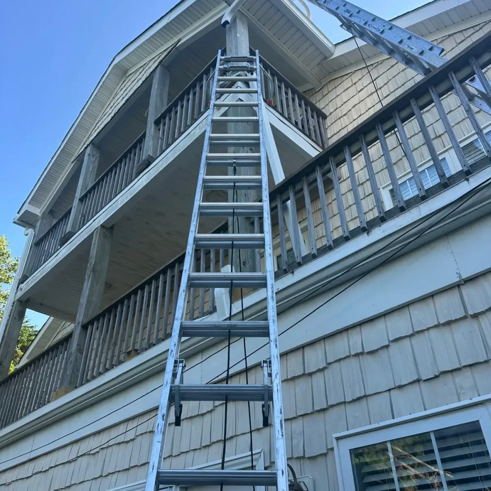 Smithfield multi-story home gutter repair and installation – ensuring proper water management.