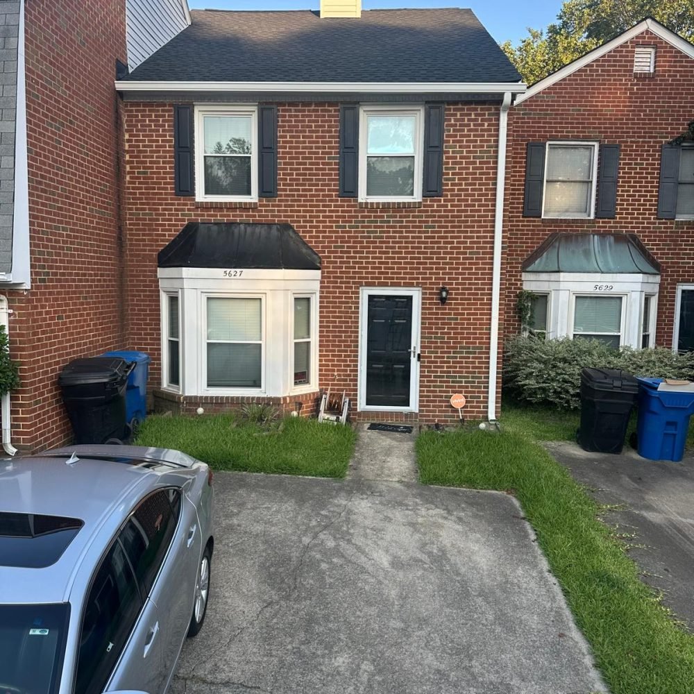 Suffolk residential property with seamless gutter installation by Gutter Masters for enhanced home protection.