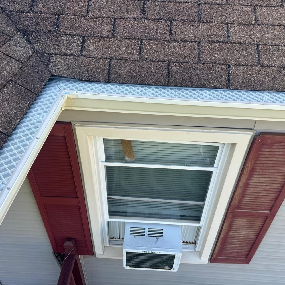 Chesapeake home with professional gutter guard installation to prevent clogs and improve water flow.