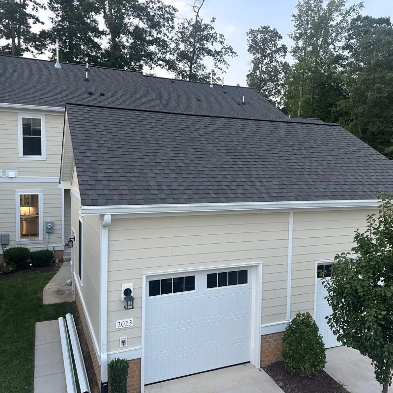 New gutter installation on residential home in Virginia Beach by Gutter Masters – durable seamless gutters for better drainage.