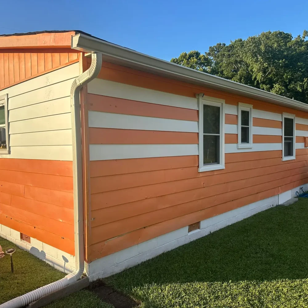 Professional gutter installation on a modern home in Virginia Beach with durable filters and guards for long-lasting protection.