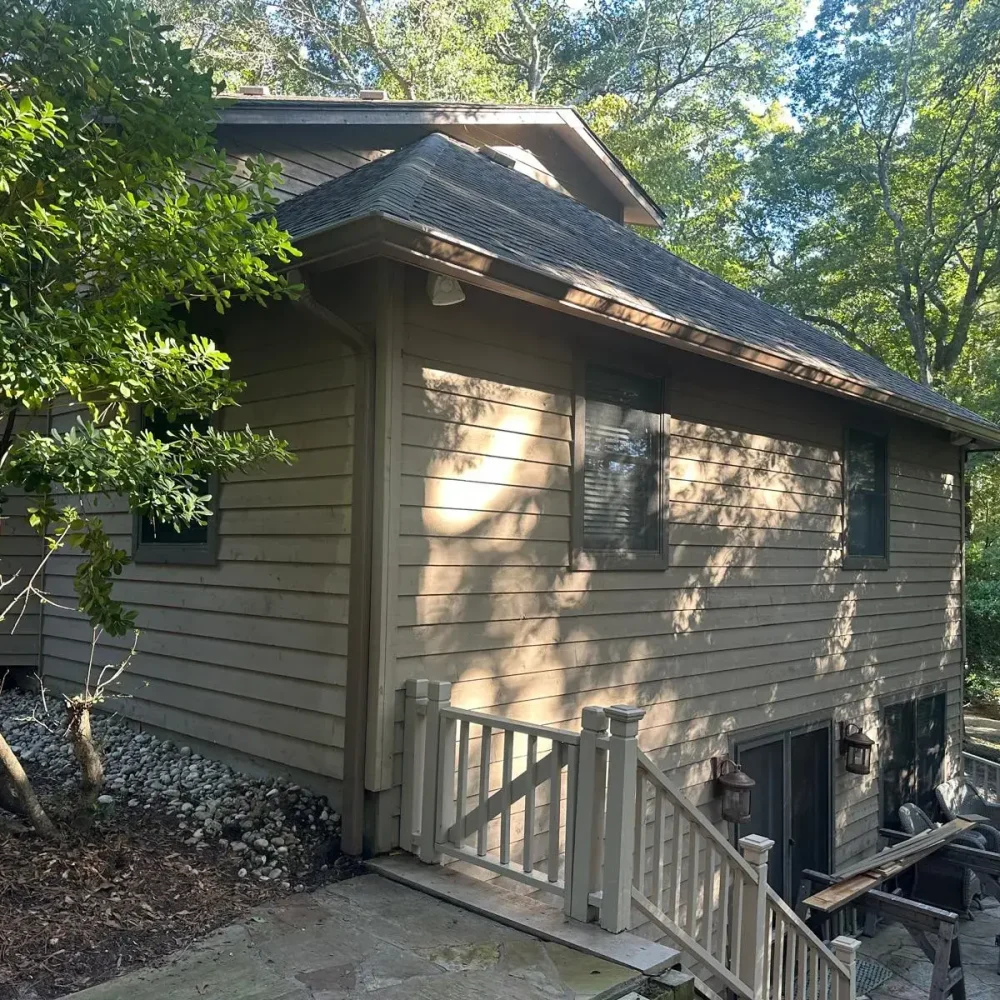 Urgent gutter repair and realignment completed on a storm-damaged house in Chesapeake