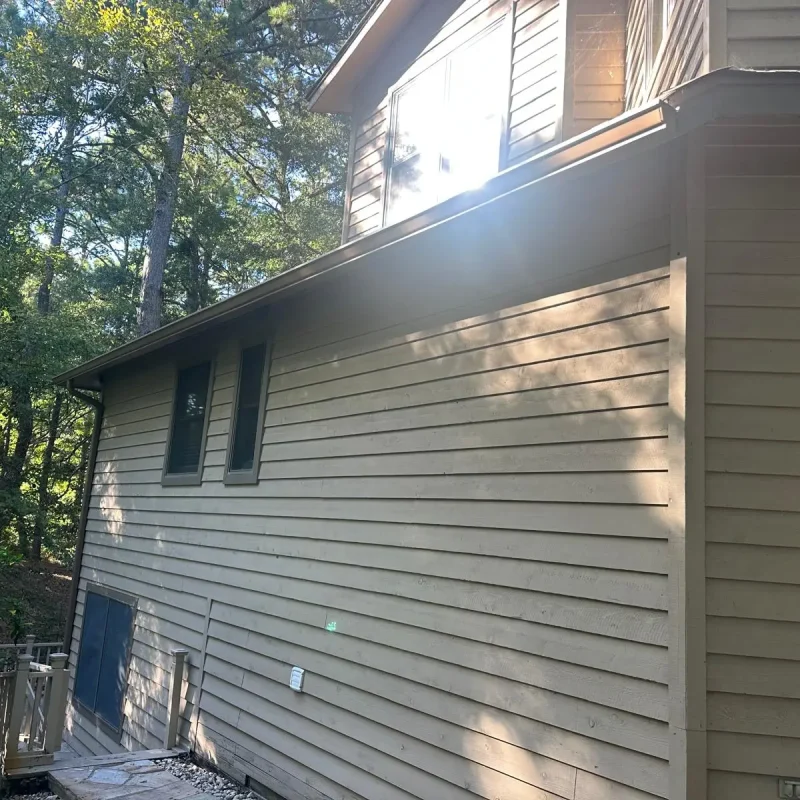 Urgent gutter repair and realignment completed on a storm-damaged house in Chesapeake to prevent water runoff.