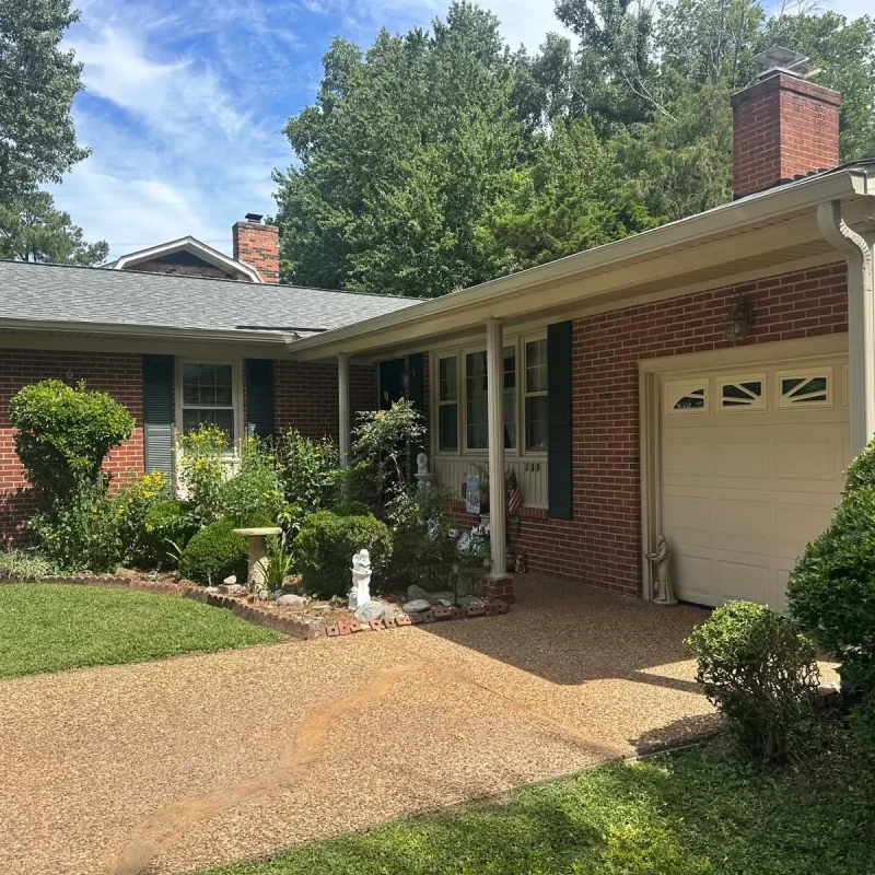 Full gutter replacement and downspout upgrade for a residential property in Newport News, VA.