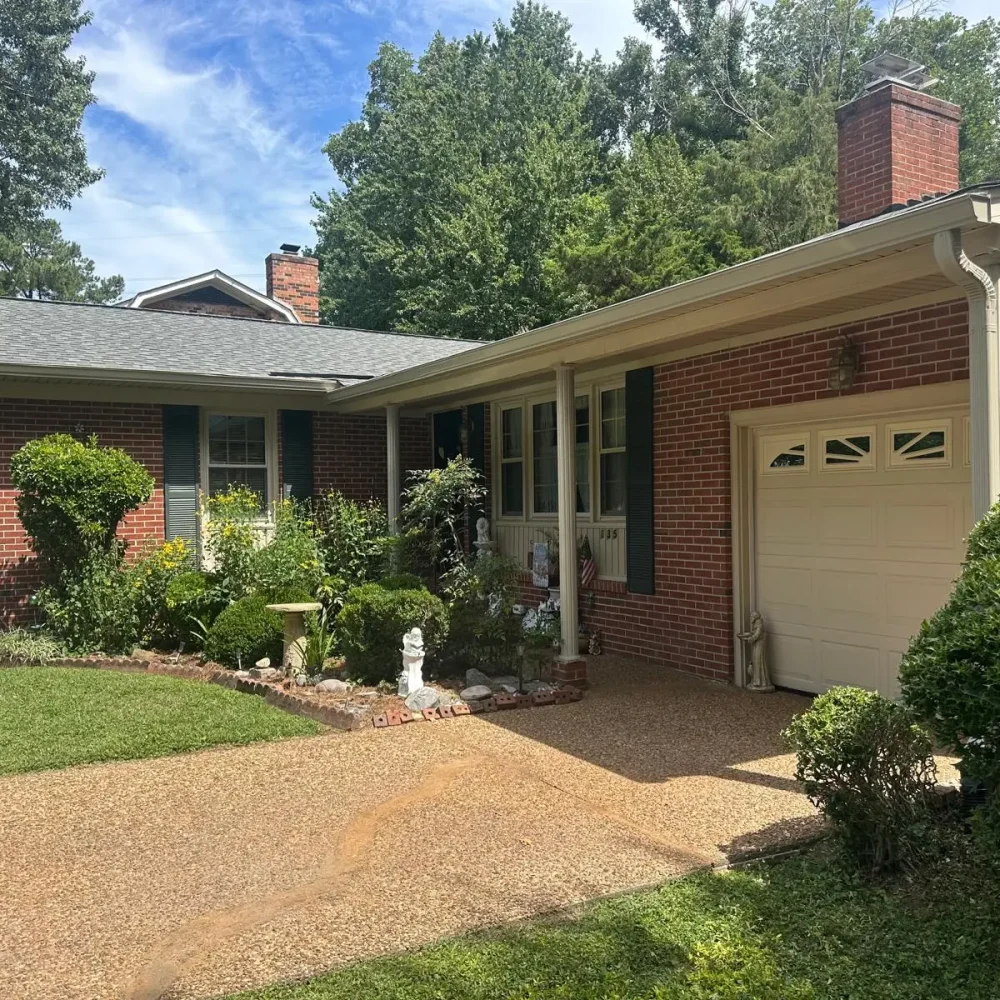 Full gutter replacement and downspout upgrade for a residential property in Newport News, VA.