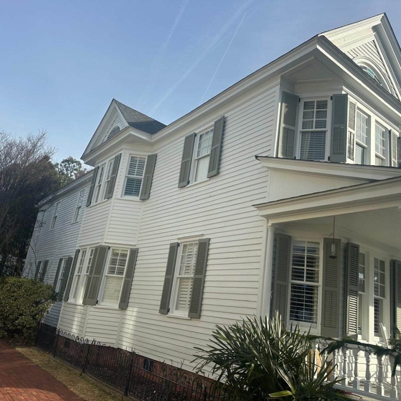 Two-story Virginia home fitted with custom seamless gutters for improved drainage and curb appeal.