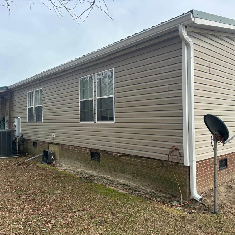 Side view of seamless gutter system installed by Gutter Masters Pro in Conway NC