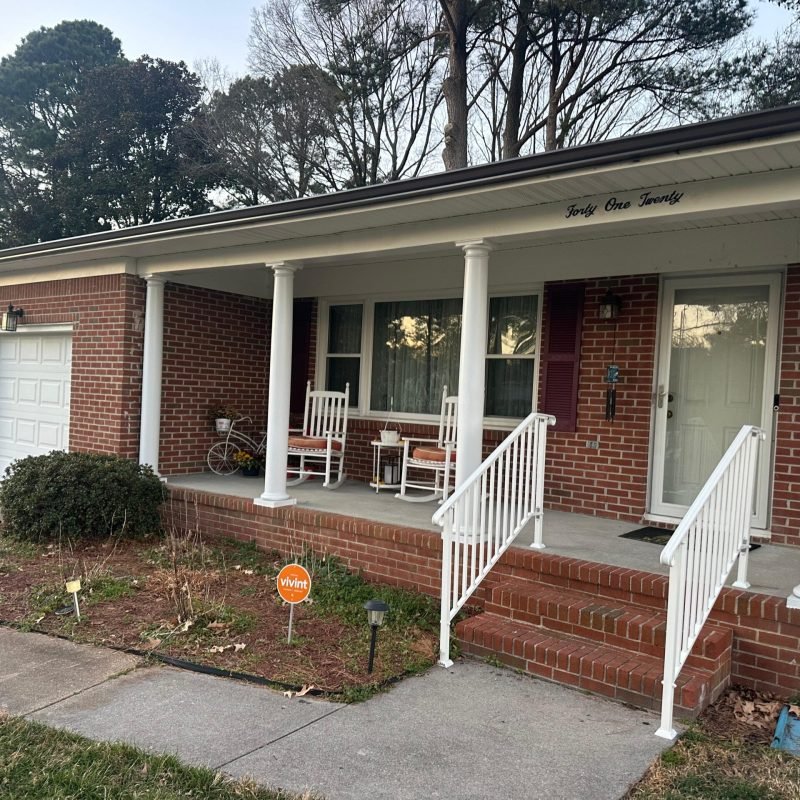 Seamless gutters installed on a brick home in Portsmouth VA after full gutter replacement