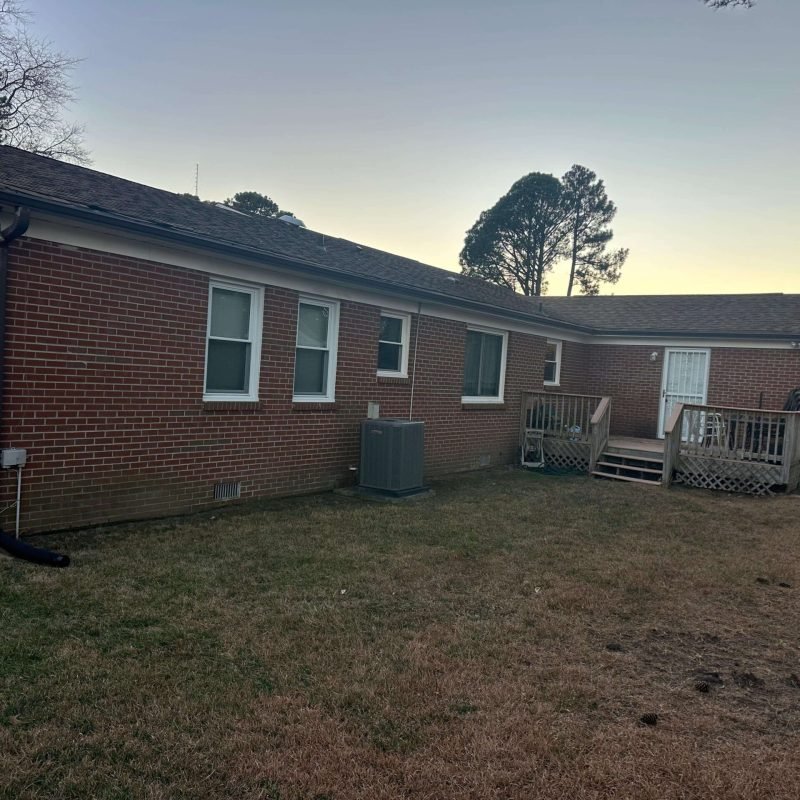 New seamless gutters installed around the home perimeter in Portsmouth VA for long-term protection