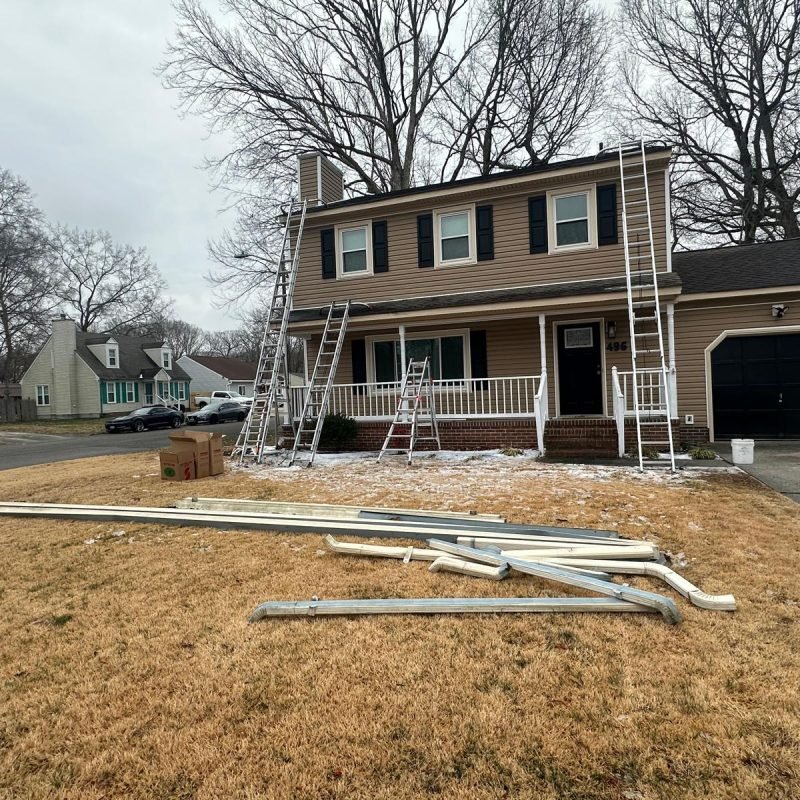 Removed traditional sectional gutters laid out during gutter replacement in Newport News Virginia