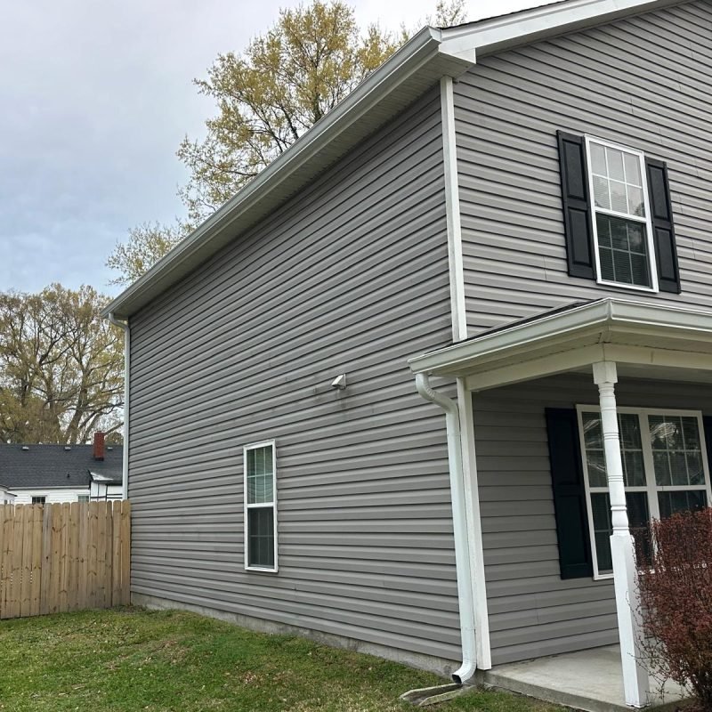 Seamless aluminum gutter replacement in Norfolk VA installed on a residential home exterior