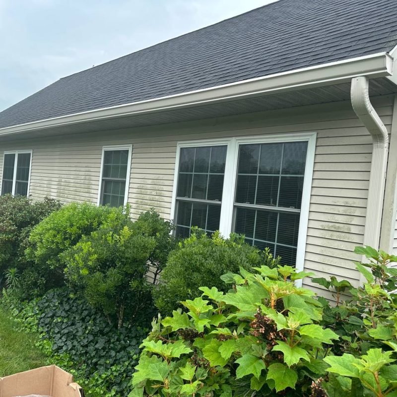 old gutters replaced with seamless gutters in the Conway home
